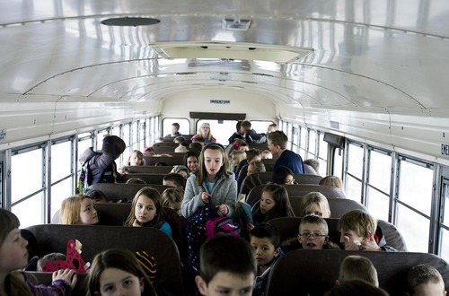 Djamila Grossman  |  The Salt Lake Tribune

When they learned that bus service would be canceled at Sunrise Elementary in Smithfield, parents banded together to run their own bus service. Julia Chambers gets out at the bus stop in Smithfield, Thursday, Jan. 13, 2011.