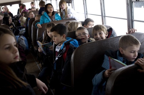 Djamila Grossman  |  The Salt Lake Tribune

When they learned that bus service would be canceled at Sunrise Elementary in Smithfield, parents banded together to run their own bus service. Kids wait for the bus to leave after school in Smithfield, Thursday, Jan. 13, 2011.