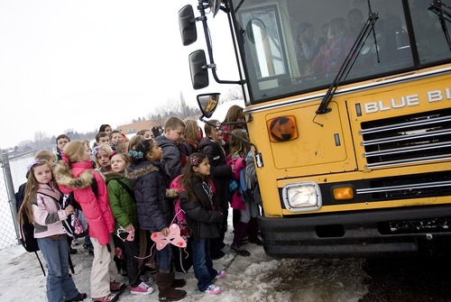 Djamila Grossman  |  The Salt Lake Tribune

When they learned that bus service would be canceled at Sunrise Elementary in Smithfield, parents banded together to run their own bus service. Kids enter the bus after school in Smithfield, Thursday, Jan. 13, 2011.