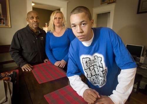 Paul Fraughton  |  The Salt Lake Tribune
Kaleb Winston stands in his living room with his parents, Kevin and Lisa Winston, on Dec. 28. They say Kaleb, who is a good student, was wrongly targeted by police as having gang affiliations.