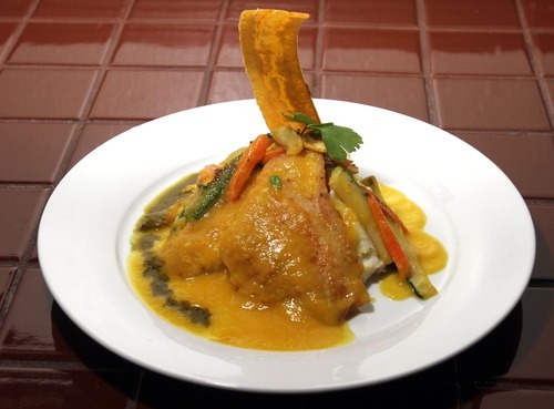Rick Egan   |  The Salt Lake Tribune
Red snapper fillet over mashed potatoes, vegetables and yellow bell pepper coulis at Adobos Caribbean Grill in Sandy.