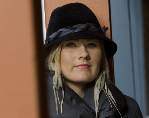 Steve Griffin  |  The Salt Lake Tribune
 
Fedora's and puffy coats, like the ones worn here by Nikki Dodson will be a fashion staple during the 2011 Sundance Film Festival.