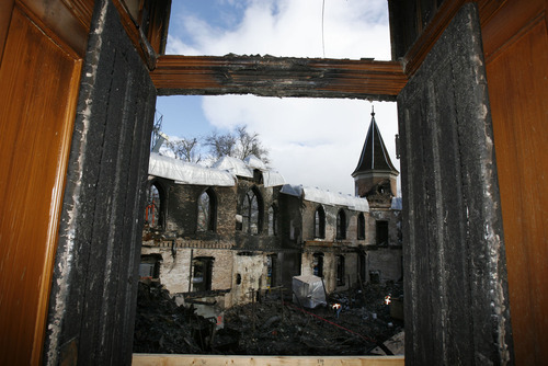 Francisco Kjolseth  |  The Salt Lake Tribune
Burned doors frame the view from the South West tower as the Provo fire department gives another tour of the remains of the historic Tabernacle where 75 tons of debris has been removed so far. Though the investigation is not complete the fire department is content to state that the fire was not deliberately set and was from an 