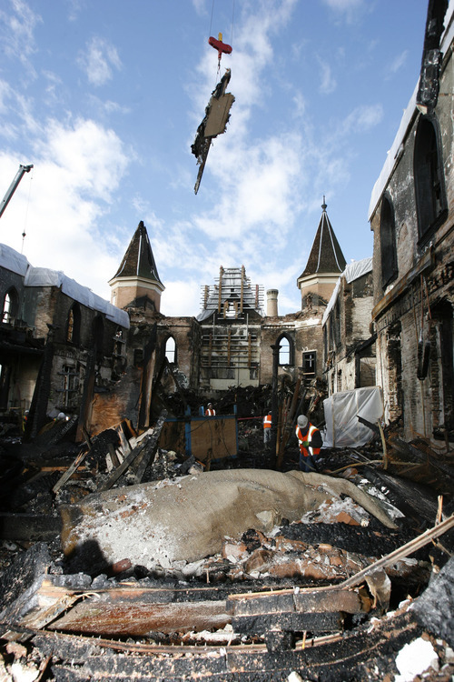 Francisco Kjolseth  |  The Salt Lake Tribune
Crews remove debris as the Provo fire department gives another tour of the remains of the historic Tabernacle where 75 tons of debris has been removed so far. Though the investigation is not complete the fire department is content to state that the fire was not deliberately set and was from an 