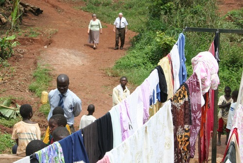 Jeremiah Stettler | The Salt Lake Tribune

Lincoln and Marilyn Barlow descend a steep hillside in southern
Uganda to a community wash basin, where dozens of women and children are scrubbing their clothes and stringing them up on lines. The LDS Church paid for the project as part of a humanitarian effort to bring cleaner water and better sanitation to the African nation.
