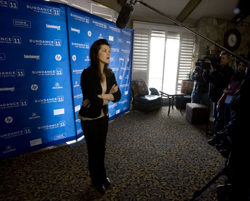 Steve Griffin  |  The Salt Lake Tribune
 
Daphne Zuniga talks with the press as she attends the Sundance premiere of 