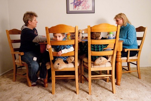Trent Nelson  |  The Salt Lake Tribune
Kelley (left) and Kaye Beeny sit down to dinner with their sons Ben (left) and Sam in their Tooele home. Three years ago, Kaye gave birth to the twins with the help of a sperm donor. The boys call both women, 