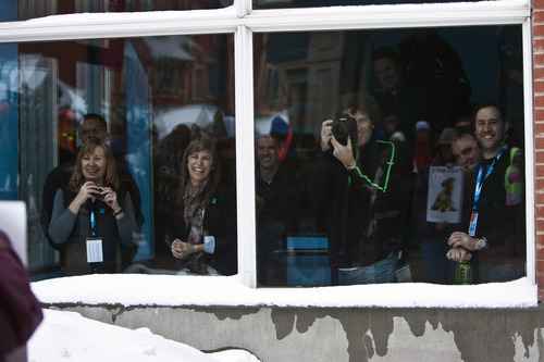 Chris Detrick  |  The Salt Lake Tribune 
Festivalgoers watch as a flash mob dances during the Sundance Film Festival Saturday January 22, 2011.