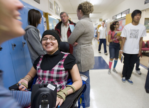 Al Hartmann  |  The Salt Lake Tribune 
Lina Nguyen was paralyzed in a car accident shortly before her junior year of high school. After a year and a half, she's returning to Granger High School to finish her senior year and graduate with her class.
Her first day back took planning with counselors, aides and nurses.