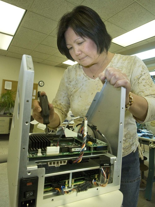 Paul Fraughton  |  The Salt Lake Tribune  
Despite the debate, the United States remains the clear world leader in medical device innovation, according to a report by PricewaterhouseCoopers. Among innovators locally is BSD Medical, where Pam Nagao on the MTX 180 Micro ThermX unit at the company's Salt lake City facility.