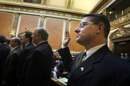 SCOTT SOMMERDORF l The Salt Lake Tribune
Freshman Rep. Ken Ivory, R-West Jordan, takes his oath of office Monday along with the other incoming representatives.