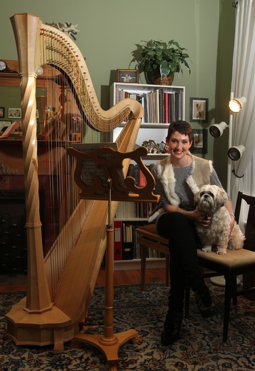 Rick Egan   |  The Salt Lake Tribune

Louise Vickerman, the Utah Symphony's principal harpist, pictured here with with her dog Ollie, is also a licensed pilot and a crack shot.