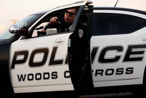 Trent Nelson  |  The Salt Lake Tribune
Woods Cross police officer Adam Osoro on patrol Thursday, January 20, 2011.