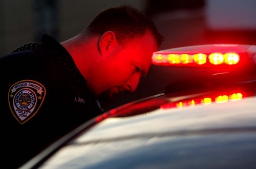 Trent Nelson  |  The Salt Lake Tribune
Woods Cross police officer Adam Osoro on patrol Thursday, January 20, 2011.