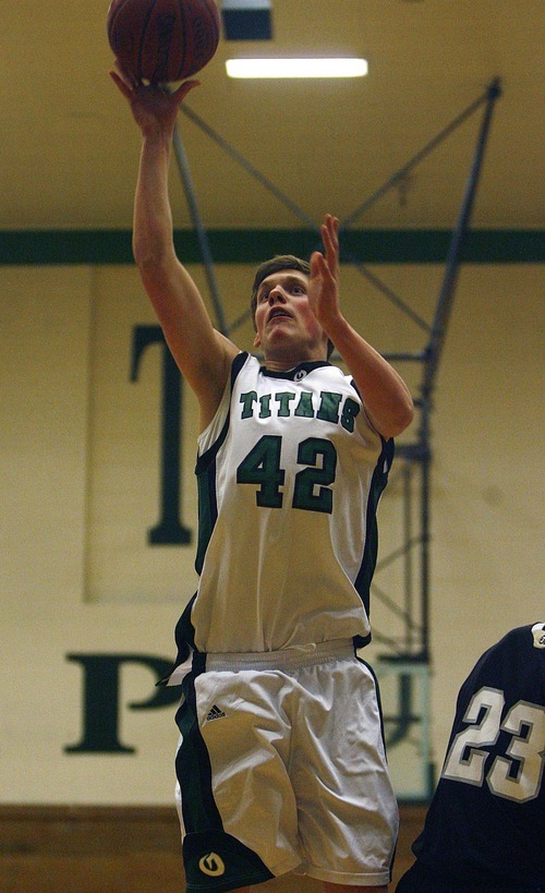 Djamila Grossman  |  The Salt Lake Tribune

Olympus High School's Colton Stewart, 42, shoots the ball during a game against Highland High School, at Olympus, Friday, Jan. 28, 2011. Highland won the game.