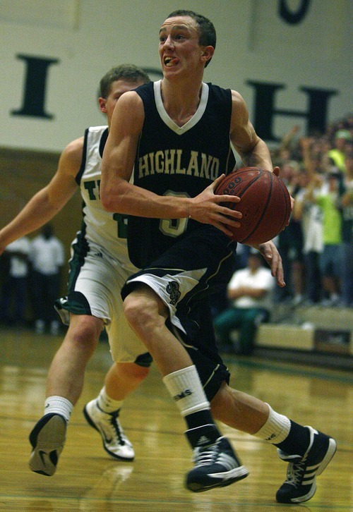 Djamila Grossman  |  The Salt Lake Tribune

Highland High School's Sam Orchard, 3, drives toward the basket during a game against Olympus High School at Olympus, Friday, Jan. 28, 2011. Highland won the game.