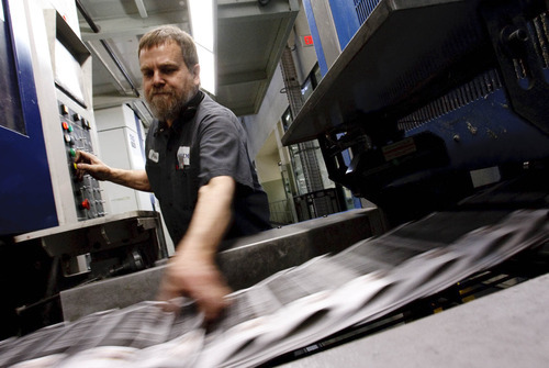 Leah Hogsten  |  The Salt Lake Tribune
MediaNews Group printing facility MediaOne pressman Bruce Gallespie prints the Mormon Times in West Valley City. Alden Global Capital has purchased at least 40 percent of MediaNews, which owns The Salt Lake Tribune.