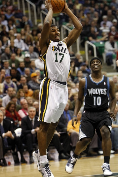 Chris Detrick  |  The Salt Lake Tribune 
Utah Jazz point guard Ronnie Price #17 grabs a rebound past Minnesota Timberwolves point guard Jonny Flynn #10 during the first half of the game at EnergySolutions Arena Friday January 28, 2011.