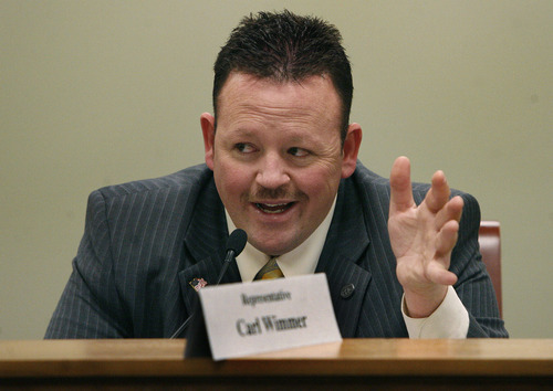 Scott Sommerdorf  l  The Salt Lake Tribune
Rep. Carl Wimmer, R-Herriman, speaks Thursday during a committee meeting to discuss Curt Oda's bill, HB0214, about concealed firearm permit fees.
