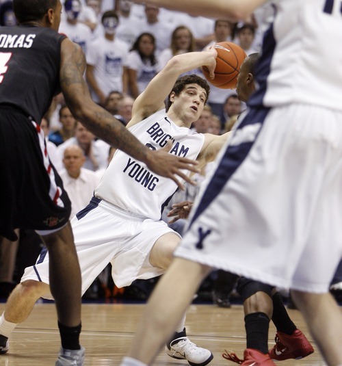 Steve Griffin  |  The Salt Lake Tribune
 
BYU guard Jimmer Fredette looks for help during first half action of the BYU versus San Diego State men's basketball game at the Marriott Center in Provo Wednesday, January 26, 2011.