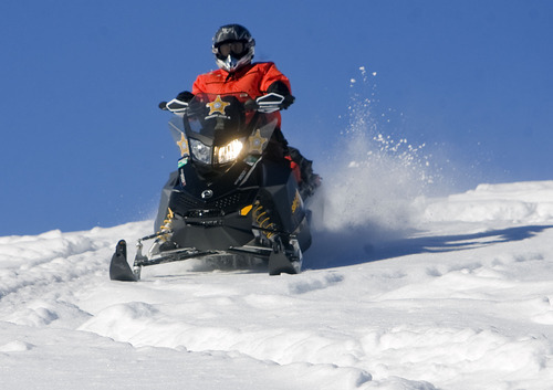 Al Hartmann  |  The Salt Lake Tribune 
Joe Donnell of Utah State Parks patrols the high country of the  Mill Hollow Snowmobile Complex east of Woodland.