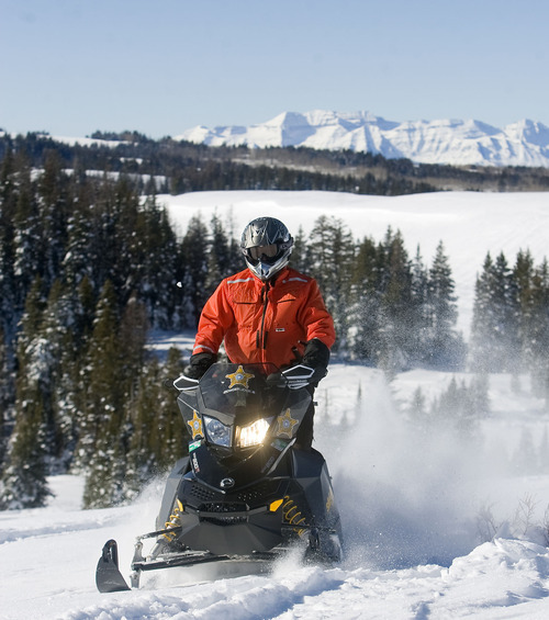 Al Hartmann  |  The Salt Lake Tribune 
Joe Donnell of Utah State Parks patrols the high country of the  Mill Hollow Snowmobile Complex east of Woodland.