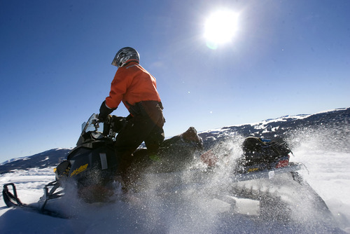 Al Hartmann  |  The Salt Lake Tribune 
Joe Donnell of Utah State Parks patrols the high country of the  Mill Hollow Snowmobile Complex east of Woodland.