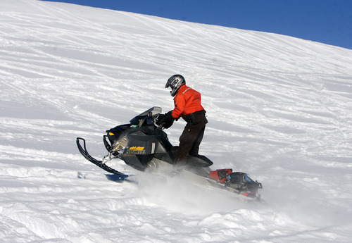 Al Hartmann  |  The Salt Lake Tribune 
Joe Donnell of Utah State Parks patrols the high country of the  Mill Hollow Snowmobile Complex east of Woodland.