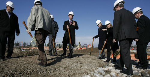Francisco Kjolseth  |  The Salt Lake Tribune
West Valley City Mayor Mike Winder, center, gathers with other officials and Hilton representatives for the ground breaking of new $5 million, 79-room Home 2 Suites by Hilton in West Valley City at 4028 West Parkway Boulevard.