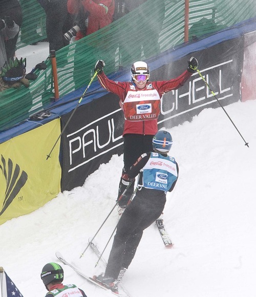 Paul Fraughton  |  The Salt Lake Tribune  Christopher Delbosco of Canada  celebrates his win in the Men's Ski Cross event at the FIS Freestyle World Ski Championships at Deer Valley on  Friday,February 4, 2011. Jouni Pellinen, with his back to the camera finished in second place.