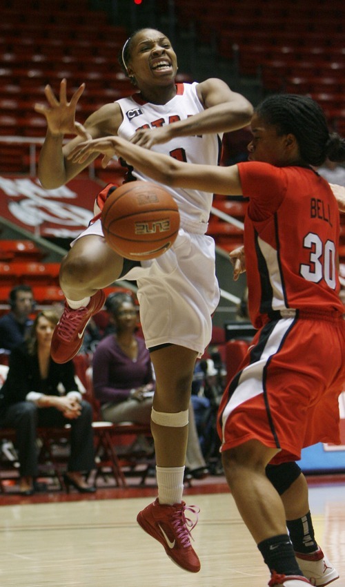 Steve Griffin  |  The Salt Lake Tribune
 
Utah's Janita Badon gets the ball striped by UNLV's Mia Bell during first half action in the Utah versus UNLV women's basketball game at the Huntsman Center in Salt Lake City Tuesday, February 1, 2011.