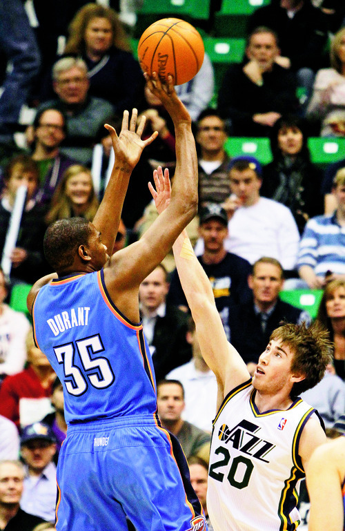 Rick Egan   |  The Salt Lake Tribune

Oklahoma City's Kevin Durant, left, shoots over Utah's Gordon Hayward, during the Thunder's victory over the Jazz on Saturday night. Durant finished with 21 points against the Utah defense.
