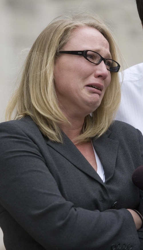 Paul Fraughton  |  The Salt Lake Tribune
Rebecca Ives fights back tears Monday as she talks to reporters outside the federal courts building in Salt Lake City. Ives' son, Sam, was killed in a bear attack in 2007. His family is suing the U.S Forest Service, with trial starting Monday in federal court.