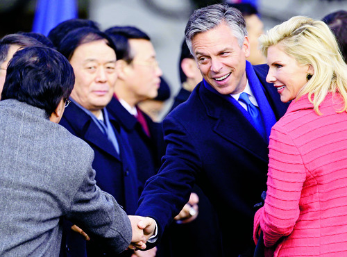 Charles Dharapak  |  Associated Press file photo
U.S. Ambassador to China Jon Huntsman Jr. and his wife, Mary Kaye, greet members of the Chinese delegation before President Barack Obama welcomed China's President Hu Jintao in January in Washington.