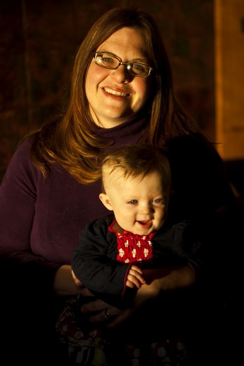 Photo by Chris Detrick | The Salt Lake Tribune 
Amanda Esko and her 9.5 month old baby Grace pose for a portrait at their home in Salt Lake City Tuesday February 8, 2011.