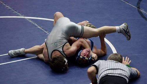 Trent Nelson  |  The Salt Lake Tribune
Payson's Jed Mellen, left, grapples with Salem Hills' Chase Wilson in a 125lb bout at the 4A & 5A high school wrestling championships at Utah Valley University in Orem, Utah, Wednesday, February 9, 2011. Mellen won.