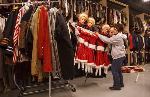 Leah Hogsten  |  The Salt Lake Tribune
Costume mistress Wendy Nagao moves the Radio City Rockettes  line in the costume cage. CenterPoint Theatre is a new performing arts center in Centerville still under construction.