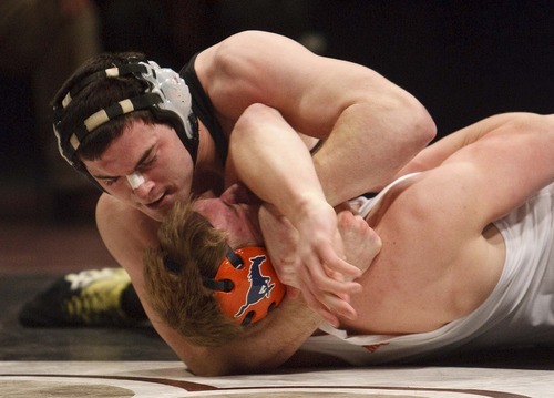 Trent Nelson  |  The Salt Lake Tribune
Sylas Wells of Mountain Crest was pinned by Sean Smith of Box Elder in the 215lb championship match of the 4A State Wrestling Championships at Utah Valley University in Orem, Utah, Thursday, February 10, 2011.