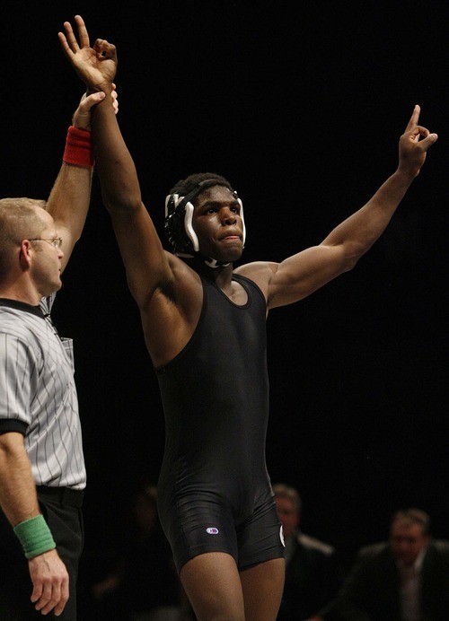 Trent Nelson  |  The Salt Lake Tribune
Brandon McBride of Olympus celebrates his win over Brady Loveless of Payson in the 171lb championship match of the 4A State Wrestling Championships at Utah Valley University in Orem, Utah, Thursday, February 10, 2011.