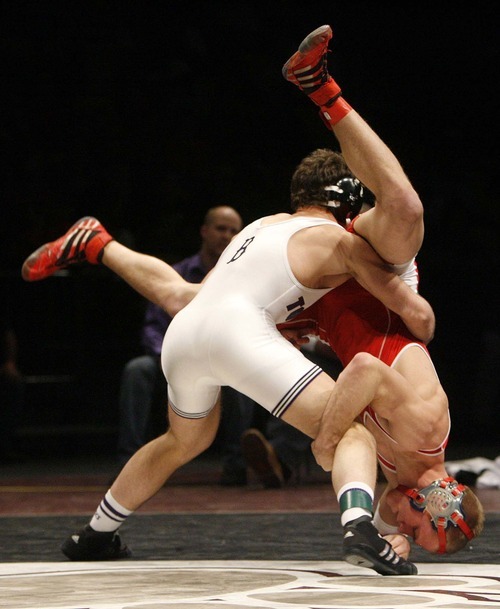 Trent Nelson  |  The Salt Lake Tribune
Thomas Manning of Tooele, left, grapples with Dustin Jenkins of Springville in the 160lb championship match of the 4A  State Wrestling Championships at Utah Valley University in Orem, Utah, Thursday, February 10, 2011. Manning won the match.