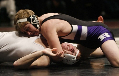 Trent Nelson  |  The Salt Lake Tribune
Cody Bunderson of Box Elder nearly pins Cole Sorensen of Mountain Crest in the 140lb championship match of the 4A State Wrestling Championships at Utah Valley University in Orem, Utah, Thursday, February 10, 2011. Bunderson won the match.