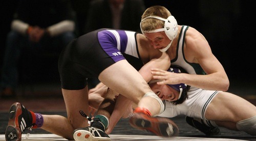 Trent Nelson  |  The Salt Lake Tribune
Rasten Yeates of Box Elder, left, faces Zac Loveless of Payson in the 135lb championship match of the 4A State Wrestling Championships at Utah Valley University in Orem, Utah, Thursday, February 10, 2011. Yeates won the match.