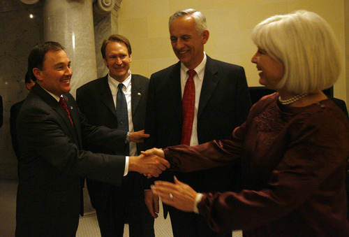 File  |  The Salt Lake Tribune

Lt. Gov. Gary Herbert shakes hands with Sens. Pat Jones, Michael Waddoups and Mark Madsen in March 2008. Herbert will replace Gov. Jon Huntsman Jr., who will resign from office to accept a nomination to become the ambassador to China.