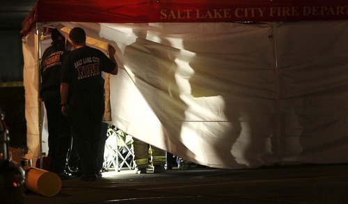 Emergency crews gather in a warming tent on the scene of the shootings at Trolly Square.
Ryan Galbraith The Salt Lake Tribune
02.12.07