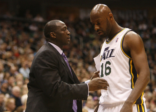 Photo by Chris Detrick | The Salt Lake Tribune 
Utah Jazz head coach Tyrone Corbin talks with Utah Jazz center Francisco Elson (16) during the game against Phoenix at the EnergySolutions Arena Friday February 11, 2011.