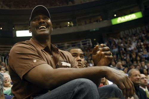 Photo by Chris Detrick | The Salt Lake Tribune 
Karl Malone watches during the first half of the game against Phoenix at the EnergySolutions Arena Friday February 11, 2011.