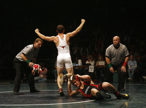 Rick Egan   |  The Salt Lake Tribune

Zach Hatch, Altamont (white) celebrates his victory over Jared Ihde of Milford,  for the 1A state wrestling title, in the 152 weight class, in Orem, Saturday, February 12, 2011.