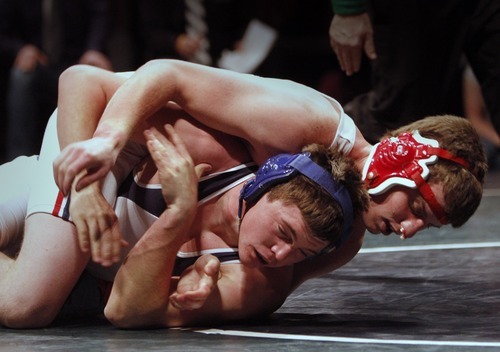 Rick Egan   |  The Salt Lake Tribune

Kyle Foy, Altamont (top) wrestles Maclane Whims, Oakley,  for the 1A state wrestling title, in the 171weight class, in Orem, Saturday, February 12, 2011.