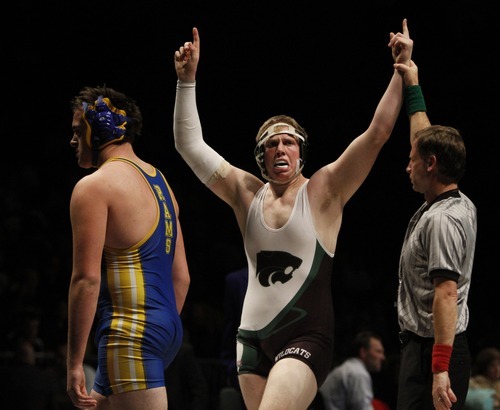 Rick Egan   |  The Salt Lake Tribune

Cody Angell, South Summitt, celebrates his win over Clayton Cluff, Parowan, for the 2A state wrestling title, in the 215 weight class, in Orem, Saturday, February 12, 2011.