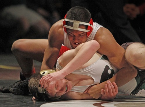 Rick Egan   |  The Salt Lake Tribune

Josh Urianza, Kanab, (top) wrestles Connor Crandall, South Summitt, for the 2A state wrestling title, in the 160 weight class, in Orem, Saturday, February 12, 2011.